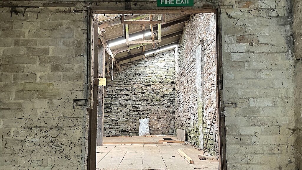 A look through to the old workshop. This will form the future common social-area.